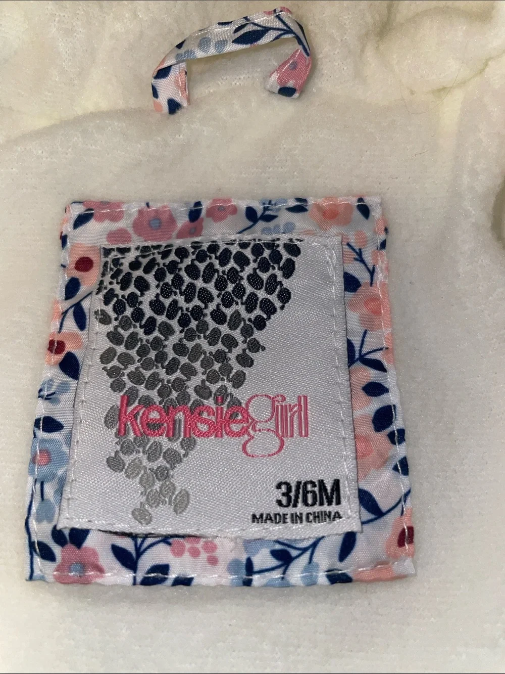 Multi color floral Kensie girl footed snowsuit (3/6mos)